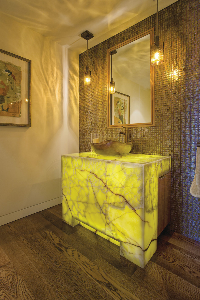 Example of a mid-sized trendy brown tile and mosaic tile dark wood floor powder room design in San Francisco with beige walls, a vessel sink and yellow countertops