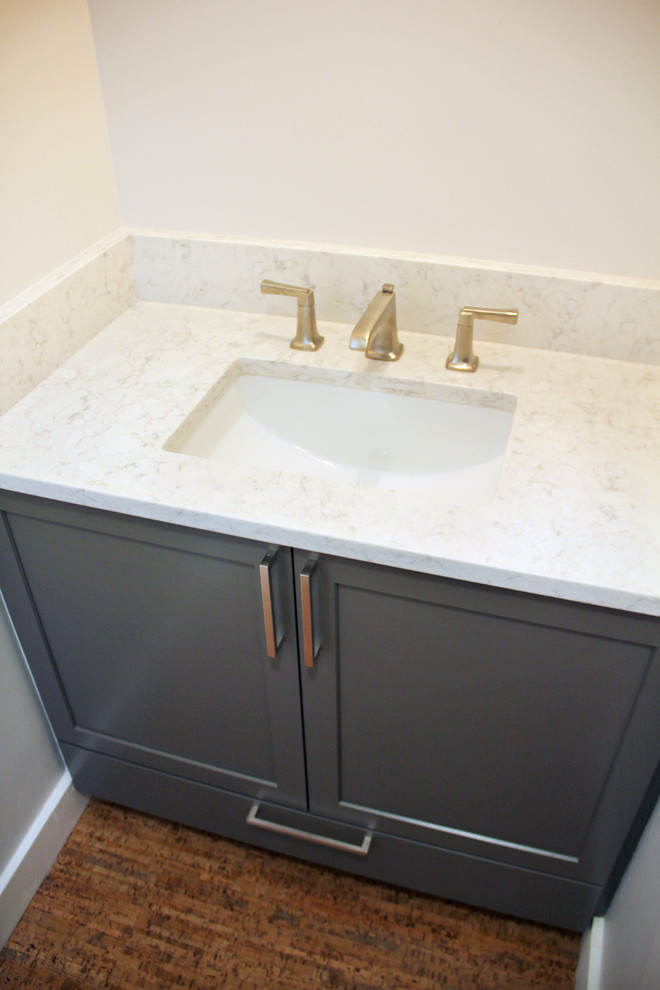 Photo of a small modern cloakroom in Portland with shaker cabinets, green cabinets, white walls, a submerged sink and engineered stone worktops.