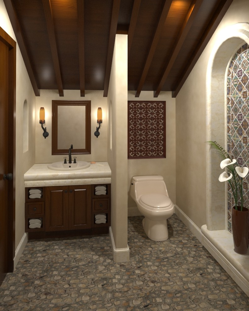 Idée de décoration pour un WC et toilettes méditerranéen.