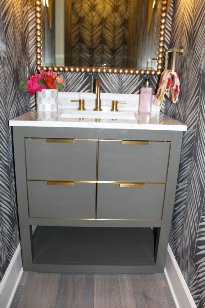 This is an example of a midcentury powder room in Orange County.