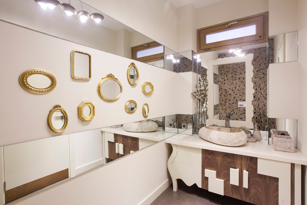 Contemporary cloakroom in Other with a vessel sink, freestanding cabinets and dark wood cabinets.