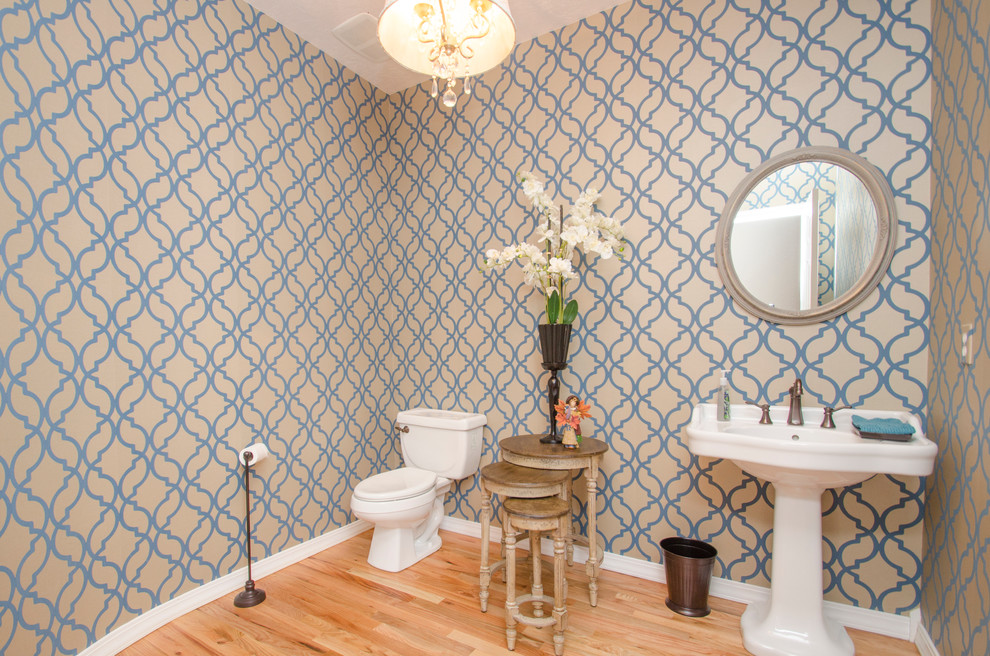 Transitional powder room photo in Boise