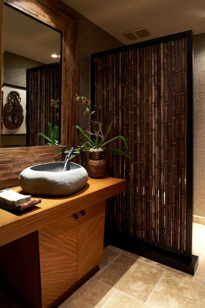 Example of an island style powder room design in Hawaii