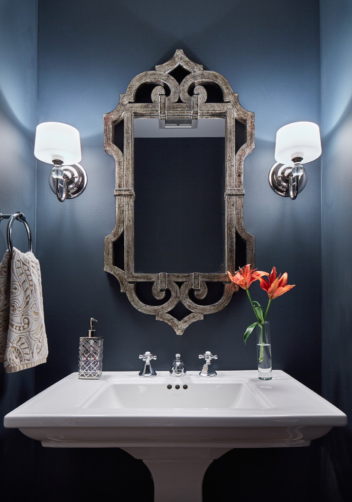 Powder room - mid-sized transitional powder room idea in Minneapolis with blue walls and a pedestal sink