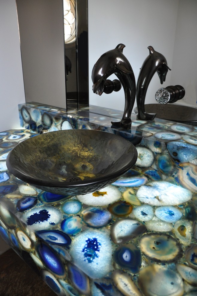 Inspiration for a powder room remodel in Orange County with blue countertops