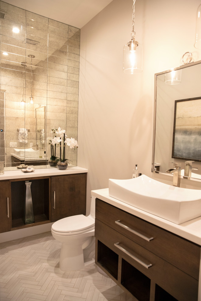 Photo of an expansive contemporary cloakroom in Sacramento with a floating vanity unit.