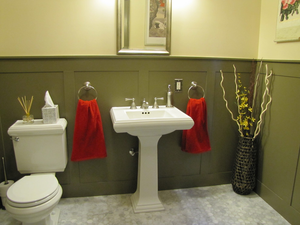This is an example of a traditional cloakroom in Minneapolis with a pedestal sink.