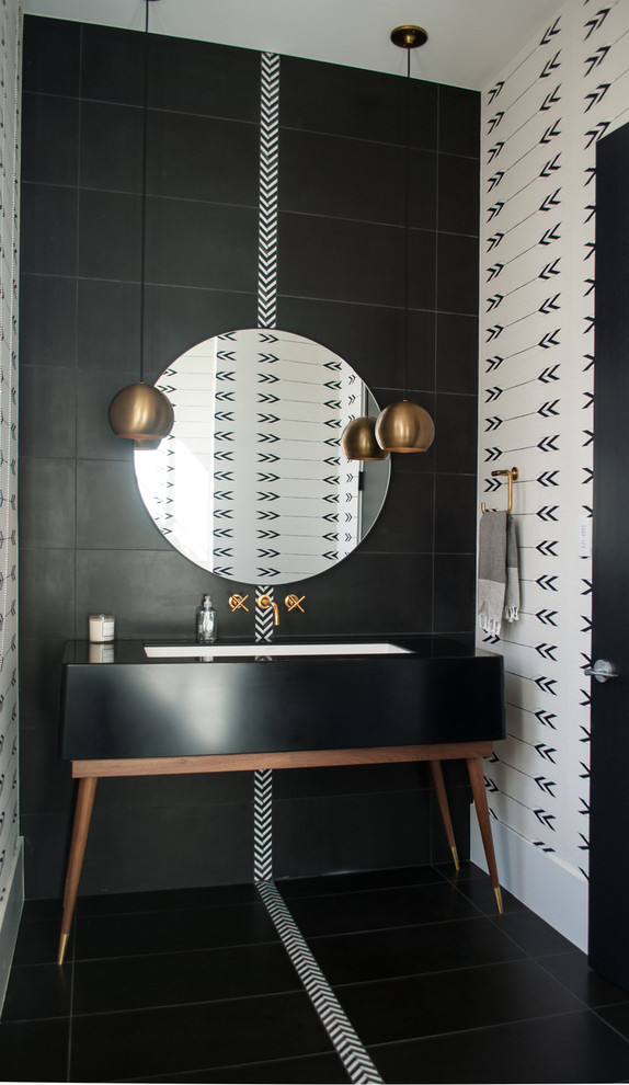 Powder room - contemporary black tile black floor powder room idea in Denver with furniture-like cabinets, black walls, an undermount sink and black countertops