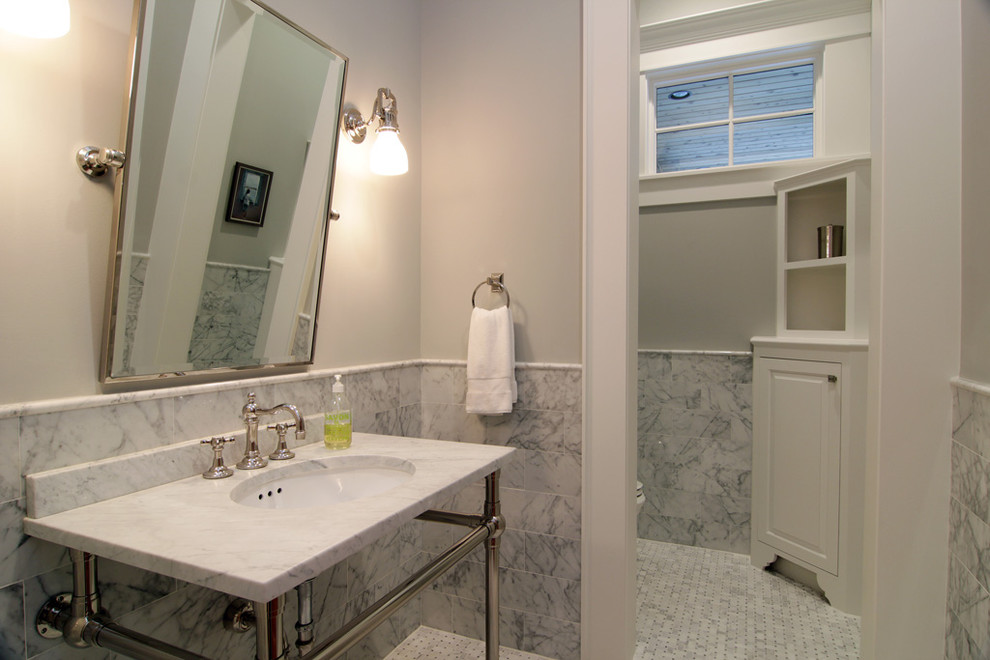 Inspiration for a timeless powder room remodel in Houston
