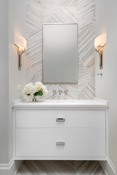 Medium sized classic cloakroom in Chicago with flat-panel cabinets, white cabinets, a wall mounted toilet, grey tiles, porcelain tiles, grey walls, porcelain flooring, a submerged sink and engineered stone worktops.