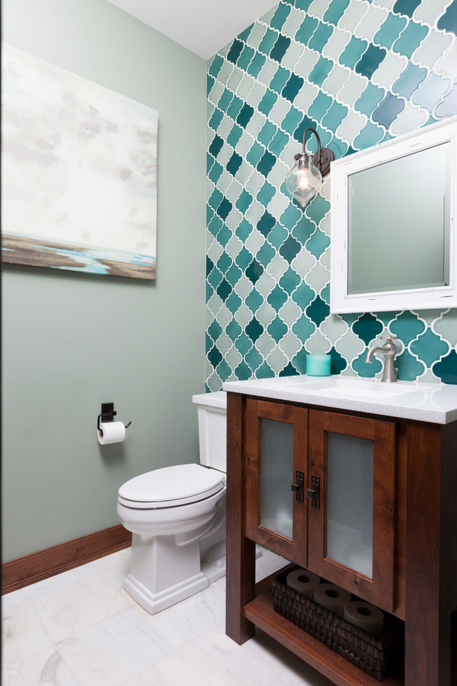 Photo of a medium sized classic cloakroom in Milwaukee with flat-panel cabinets, medium wood cabinets, a two-piece toilet, white tiles, green walls, ceramic flooring, a submerged sink, engineered stone worktops and ceramic tiles.