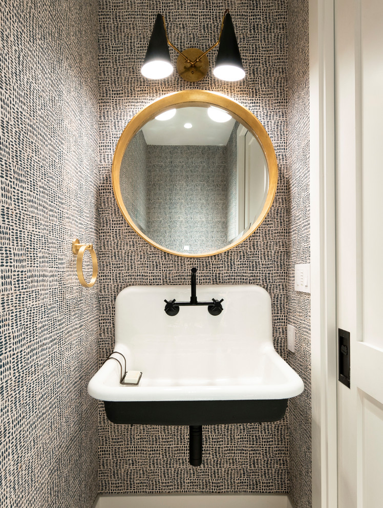 Photo of a traditional cloakroom in San Francisco with black walls and a wall-mounted sink.