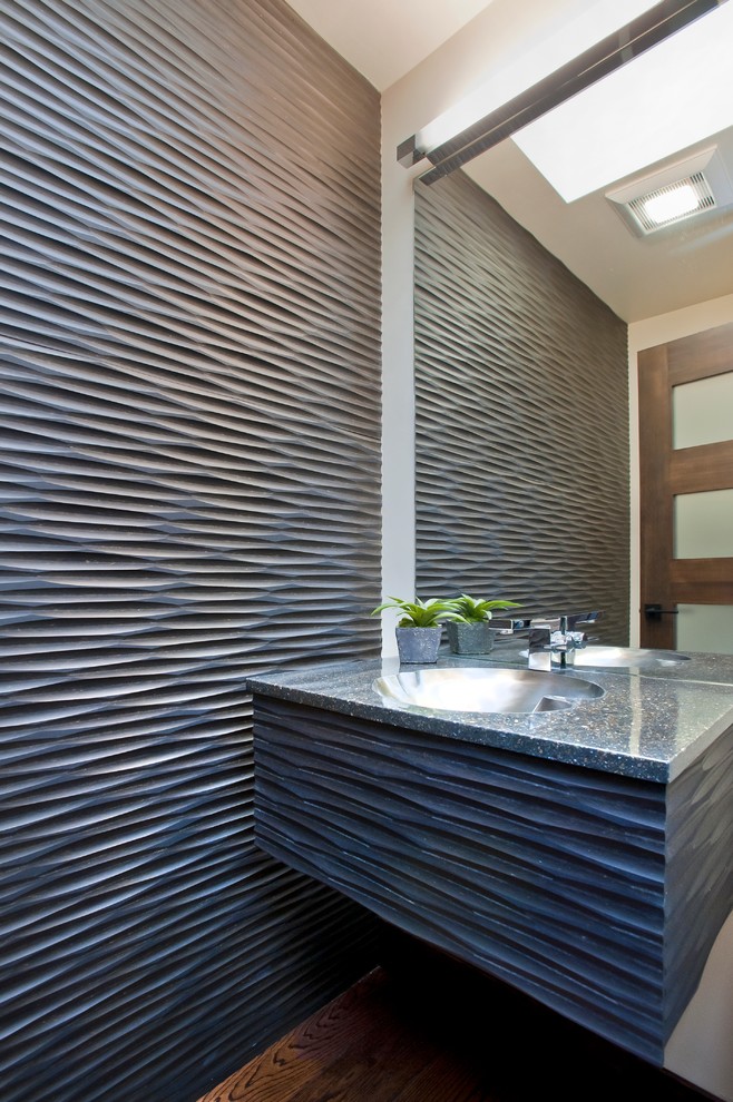 Inspiration for a powder room remodel in San Francisco with an integrated sink