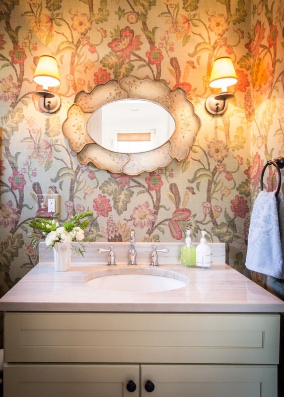 Powder room - small traditional powder room idea in Boston with green cabinets and granite countertops