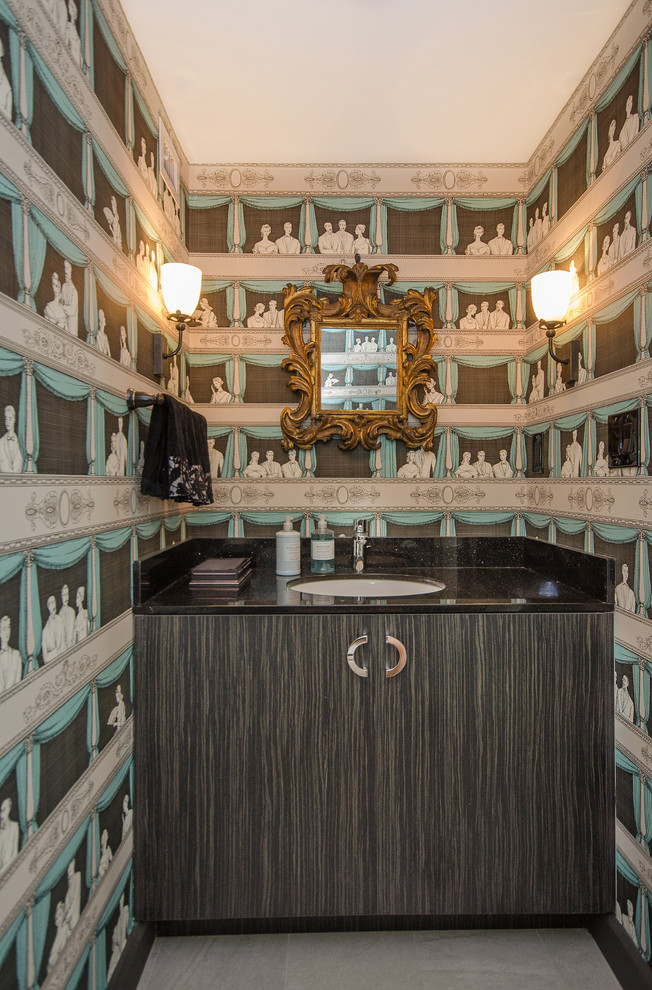 На фото: туалет среднего размера в стиле фьюжн с врезной раковиной, плоскими фасадами, темными деревянными фасадами, столешницей из гранита, разноцветными стенами и полом из керамической плитки с