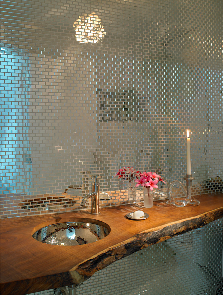 Inspiration for a contemporary cloakroom in New York with a submerged sink, wooden worktops, metal tiles and brown worktops.