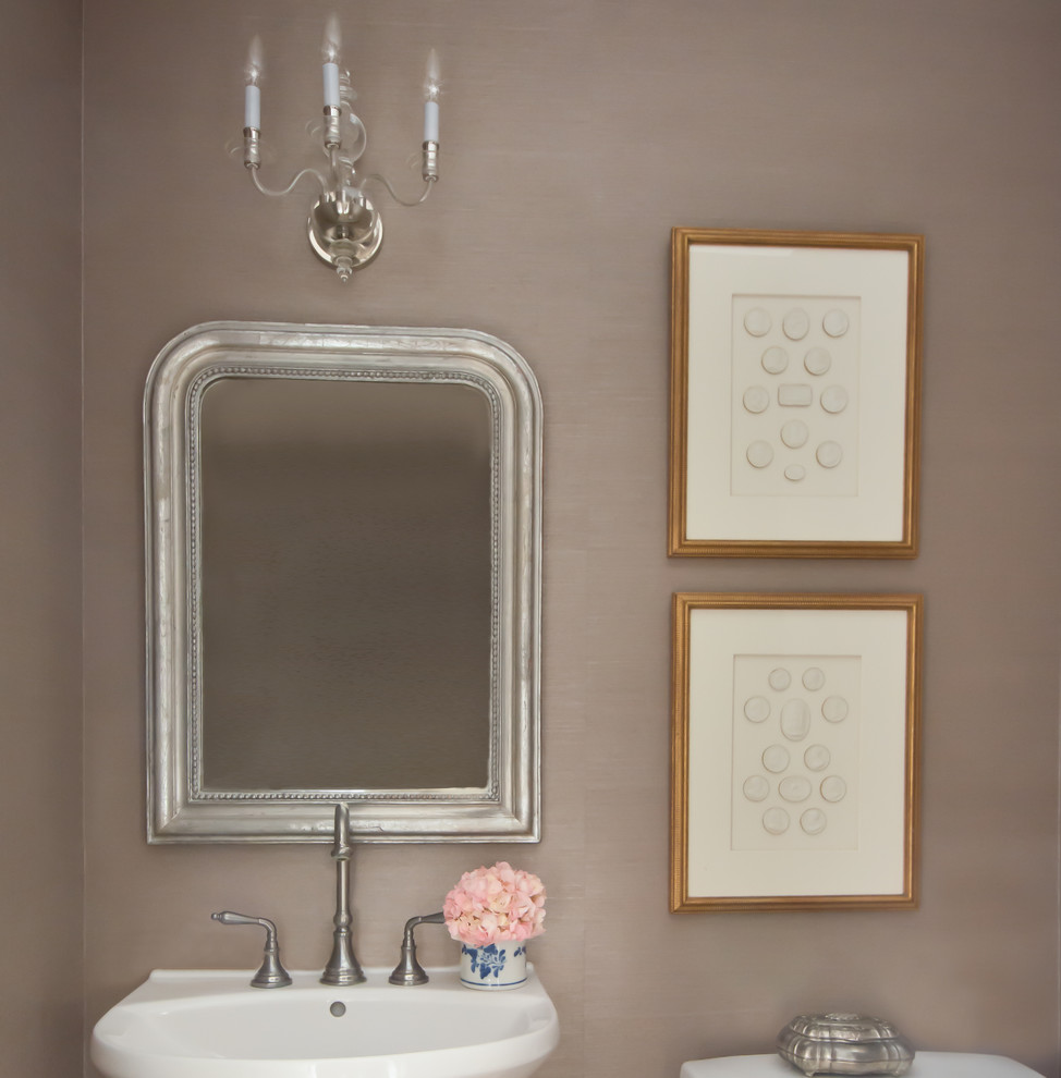 Design ideas for a small traditional cloakroom in Houston with a one-piece toilet, grey walls and a pedestal sink.