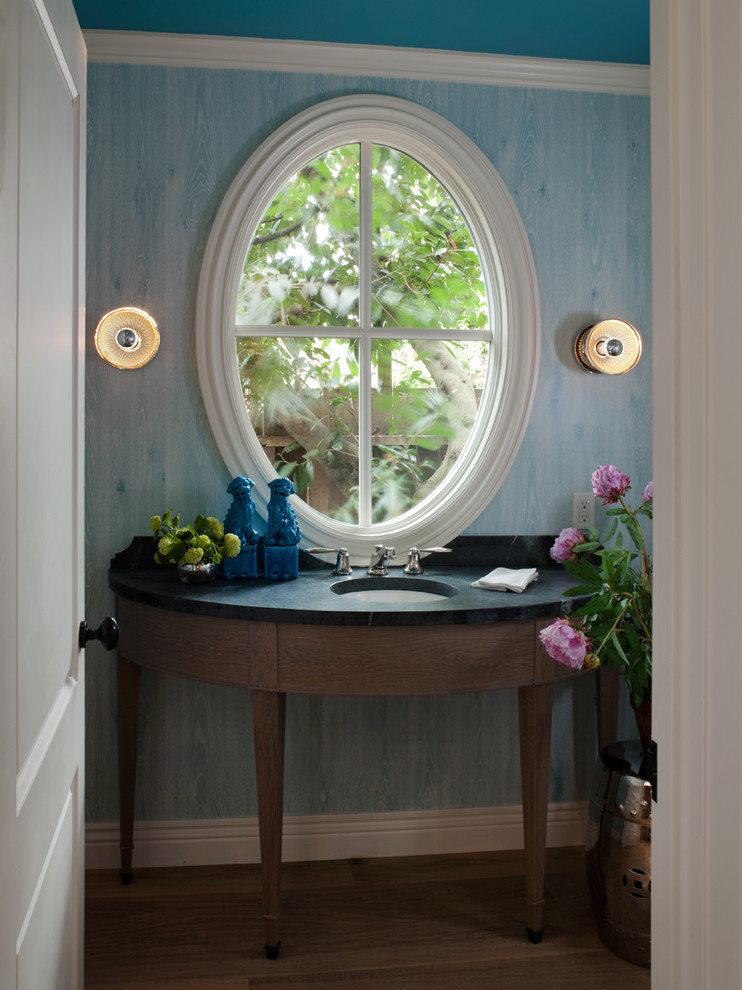 Example of a classic powder room design in San Francisco with soapstone countertops and an undermount sink