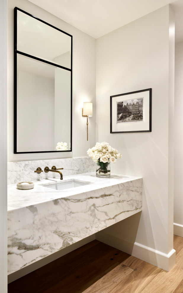 Photo of a medium sized traditional cloakroom in Phoenix with open cabinets, grey cabinets, a submerged sink, brown floors, grey worktops and a built in vanity unit.