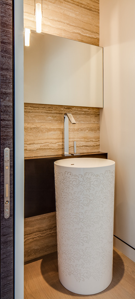This is an example of a modern cloakroom in San Francisco with limestone tiles.