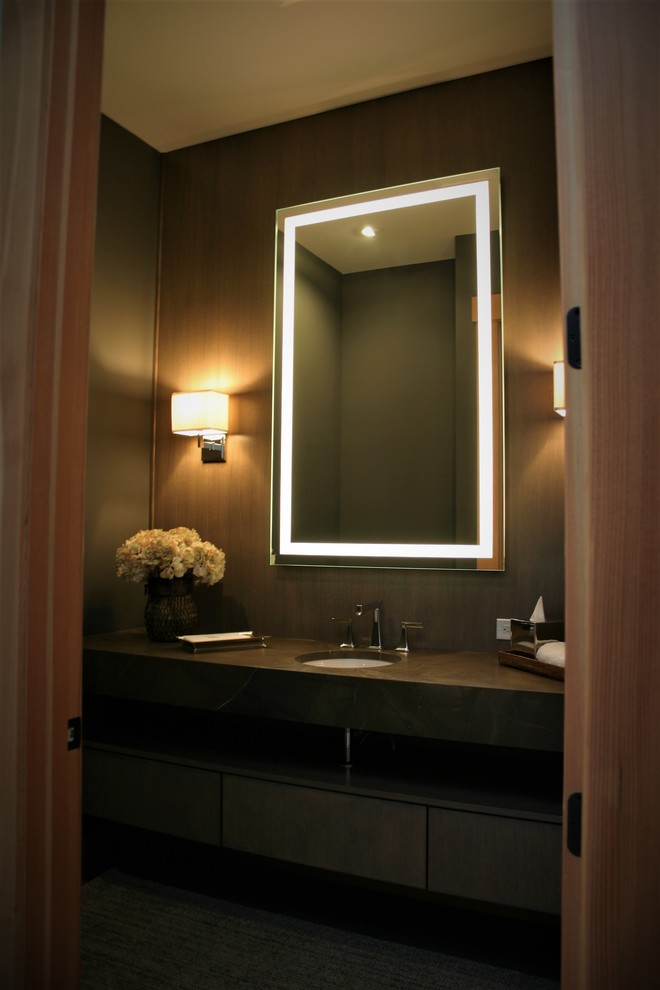 На фото: туалет среднего размера в стиле модернизм с серыми стенами, врезной раковиной, столешницей из искусственного кварца и серой столешницей