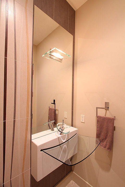 Photo of a contemporary cloakroom in Edmonton with a wall-mounted sink, multi-coloured tiles and porcelain tiles.
