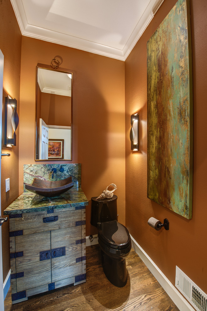 Design ideas for a small traditional cloakroom in San Francisco with freestanding cabinets, distressed cabinets, a one-piece toilet, orange tiles, orange walls, dark hardwood flooring, a pedestal sink, granite worktops, brown floors and stone slabs.