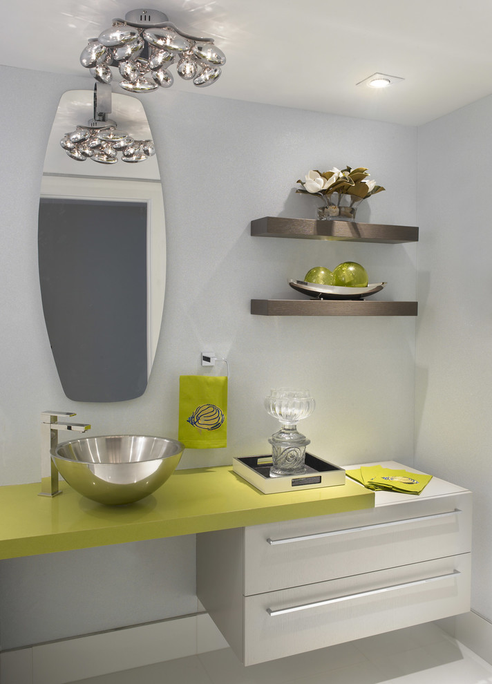 Design ideas for a medium sized modern cloakroom in Miami with flat-panel cabinets, grey cabinets, a one-piece toilet, grey walls, porcelain flooring, a vessel sink, solid surface worktops, grey floors and green worktops.