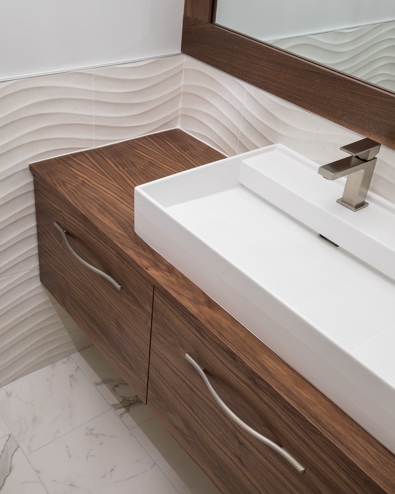 Inspiration for a small midcentury cloakroom in Denver with flat-panel cabinets, medium wood cabinets, a one-piece toilet, white tiles, porcelain tiles, grey walls, ceramic flooring, a console sink, wooden worktops, white floors and white worktops.
