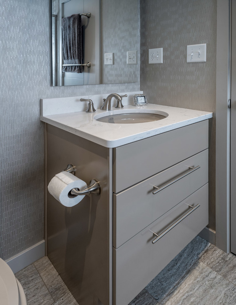 Design ideas for a small cloakroom in Other with flat-panel cabinets, grey cabinets, grey walls, porcelain flooring, a submerged sink, engineered stone worktops and grey floors.