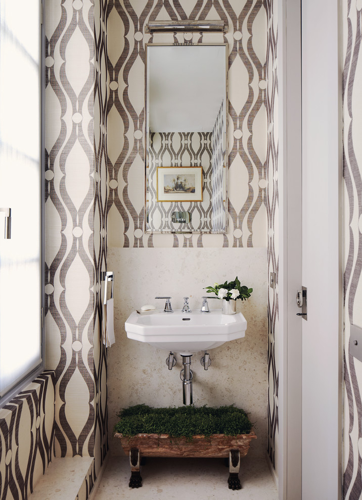 Powder room - small transitional powder room idea in New York with a wall-mount sink