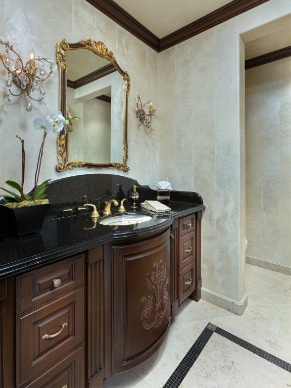 Design ideas for a classic cloakroom in Orange County with granite worktops and limestone tiles.