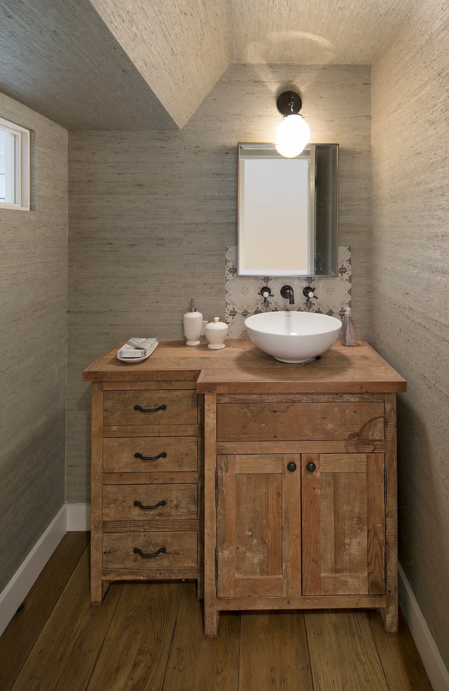 Inspiration for a small shabby-chic style cloakroom in Santa Barbara with shaker cabinets, distressed cabinets, multi-coloured tiles, mosaic tiles, beige walls, light hardwood flooring and wooden worktops.
