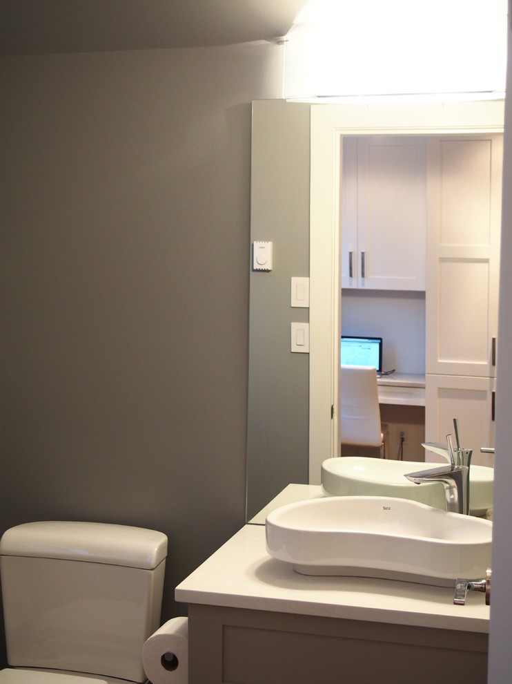 This is an example of a contemporary cloakroom in Vancouver with shaker cabinets and grey cabinets.