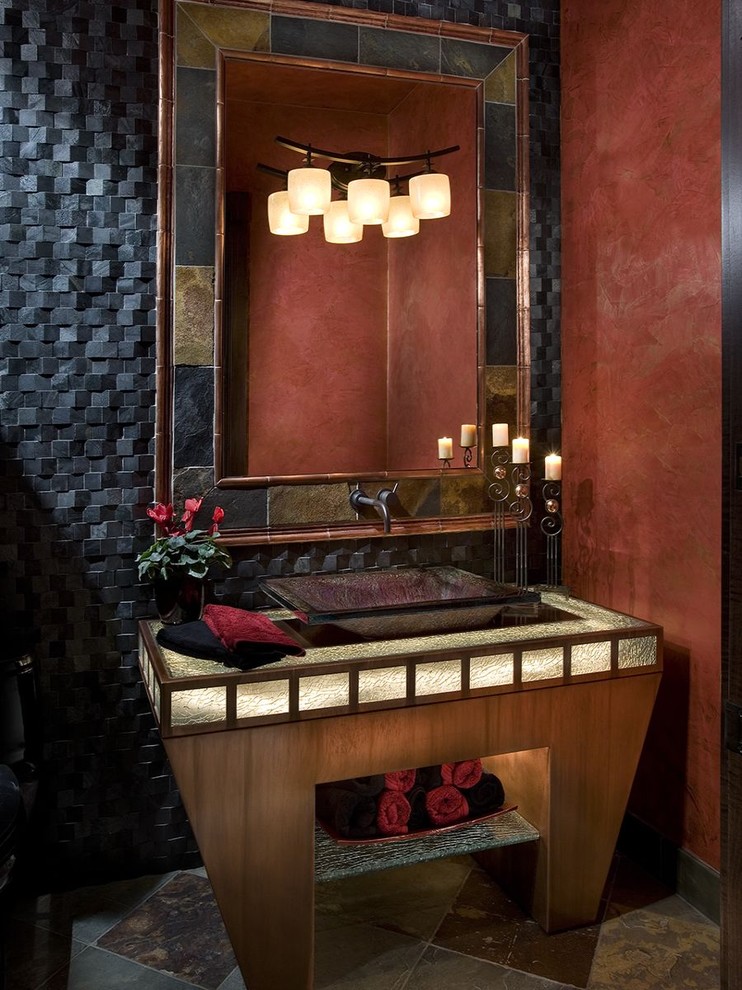 Foto di un bagno di servizio design con lavabo a bacinella e consolle stile comò
