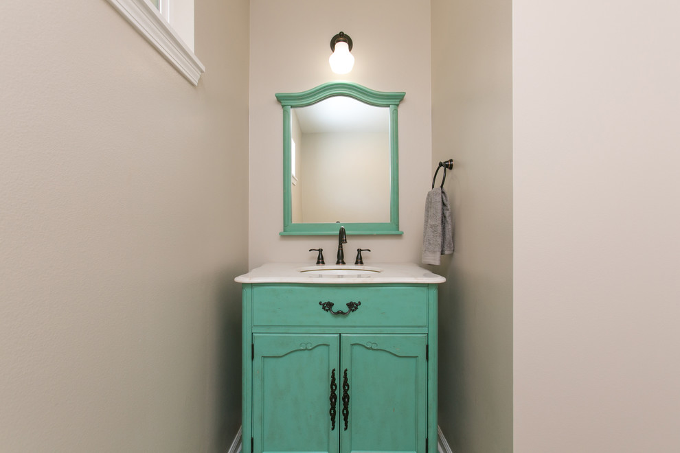 Inspiration for a small farmhouse cloakroom in Hawaii with freestanding cabinets, green cabinets, brown walls, a submerged sink and quartz worktops.
