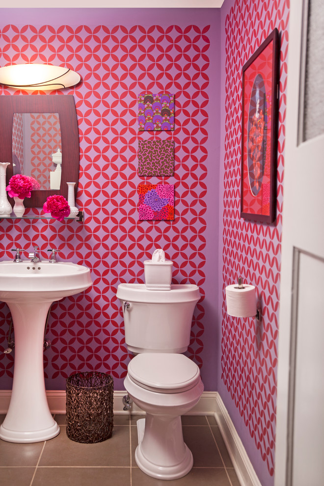 Powder room - small eclectic ceramic tile powder room idea in Philadelphia with a pedestal sink, a two-piece toilet and multicolored walls