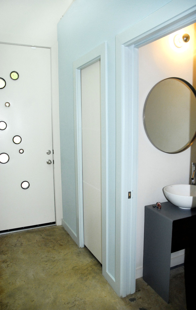 Example of a minimalist powder room design in Austin