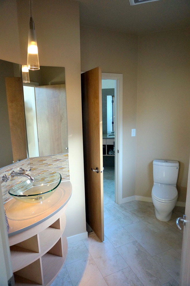 Example of a trendy powder room design in Portland