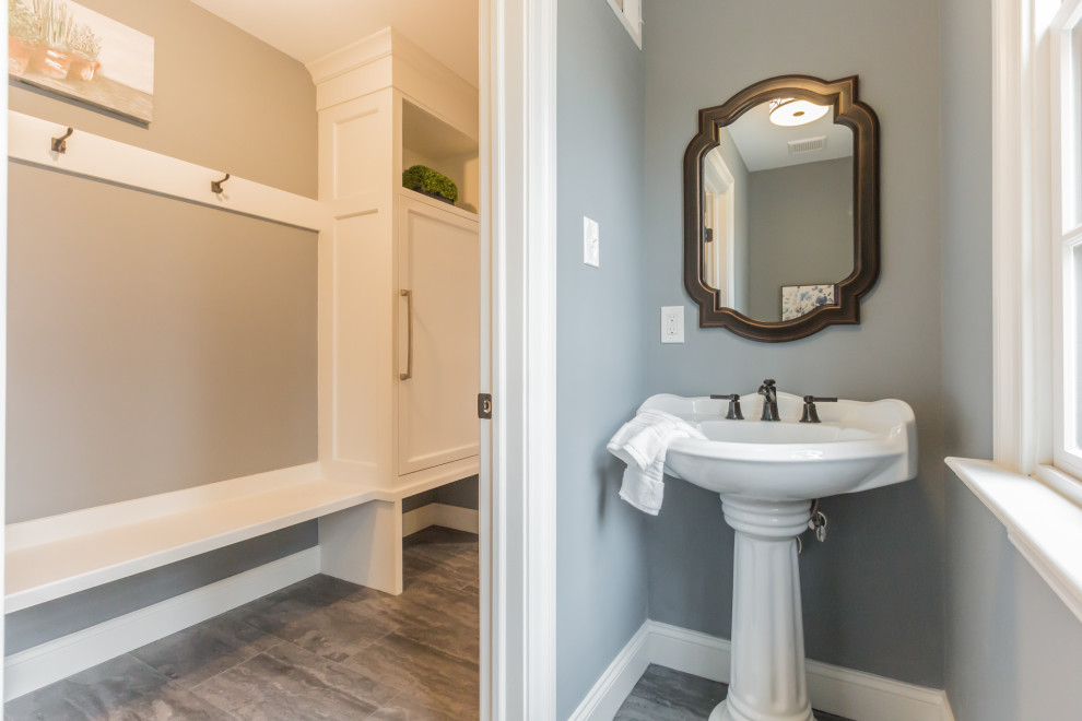 Photo of a small contemporary cloakroom in Philadelphia with white cabinets, grey walls, slate flooring, a pedestal sink, grey floors, white worktops and a freestanding vanity unit.