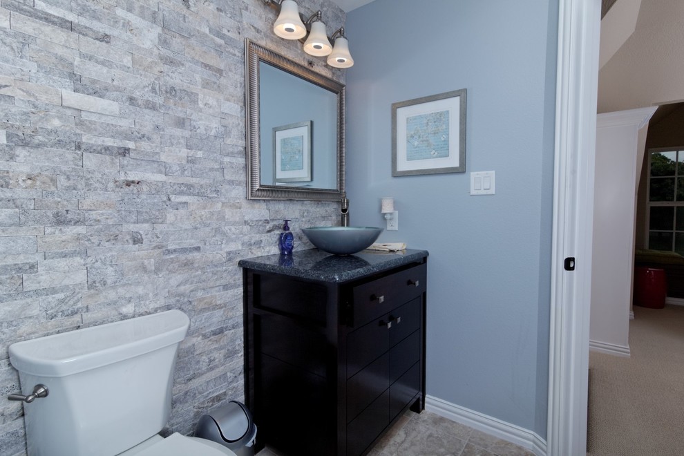 Design ideas for a small traditional cloakroom in Dallas with a vessel sink, flat-panel cabinets, dark wood cabinets, marble worktops, a two-piece toilet, blue walls, ceramic flooring, grey tiles, stone tiles and grey floors.