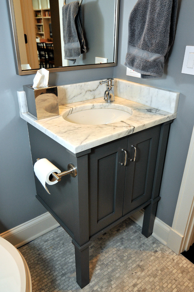 Powder room - contemporary powder room idea in Chicago with an undermount sink, gray cabinets, marble countertops, a one-piece toilet, gray walls and recessed-panel cabinets