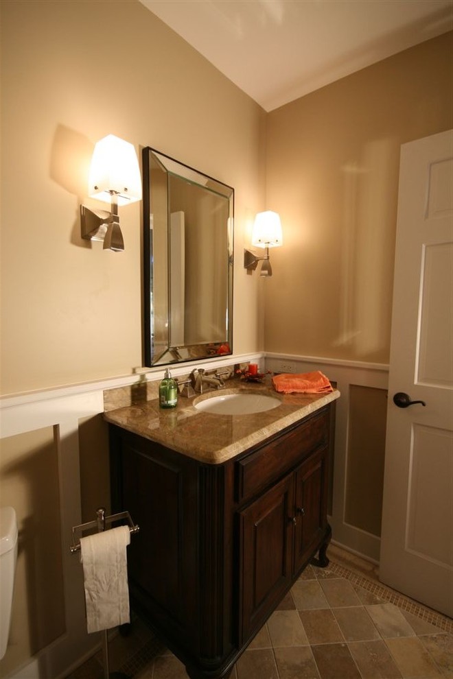 Inspiration for a timeless powder room remodel in Chicago with furniture-like cabinets