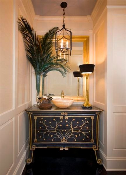 Inspiration for a small classic cloakroom in DC Metro with a vessel sink, black cabinets, marble worktops and white walls.