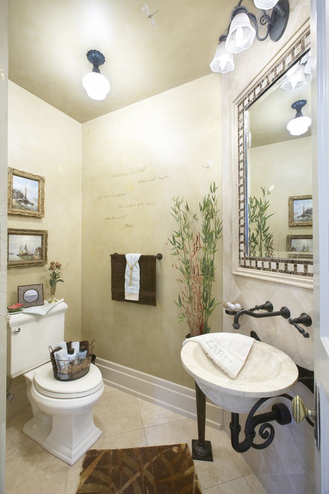 Mid-sized transitional ceramic tile powder room photo in Chicago with a two-piece toilet, beige walls and a vessel sink