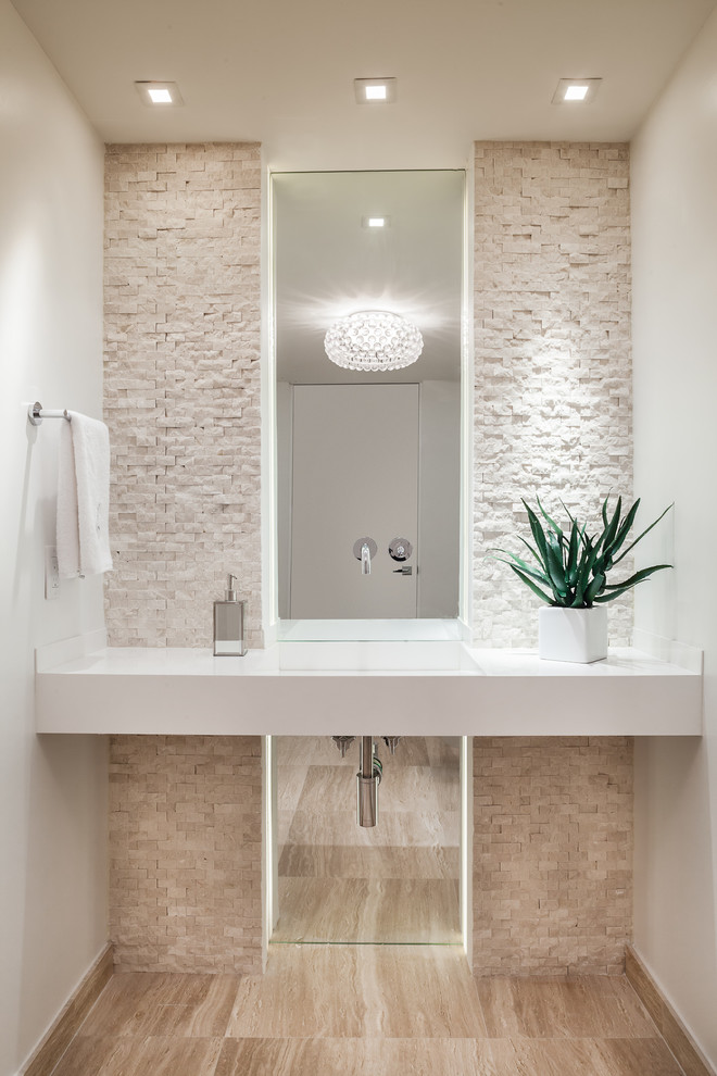 Inspiration for a small contemporary beige tile and stone tile light wood floor and beige floor powder room remodel in Miami with an integrated sink, white walls, open cabinets, white cabinets, a two-piece toilet, quartzite countertops and white countertops