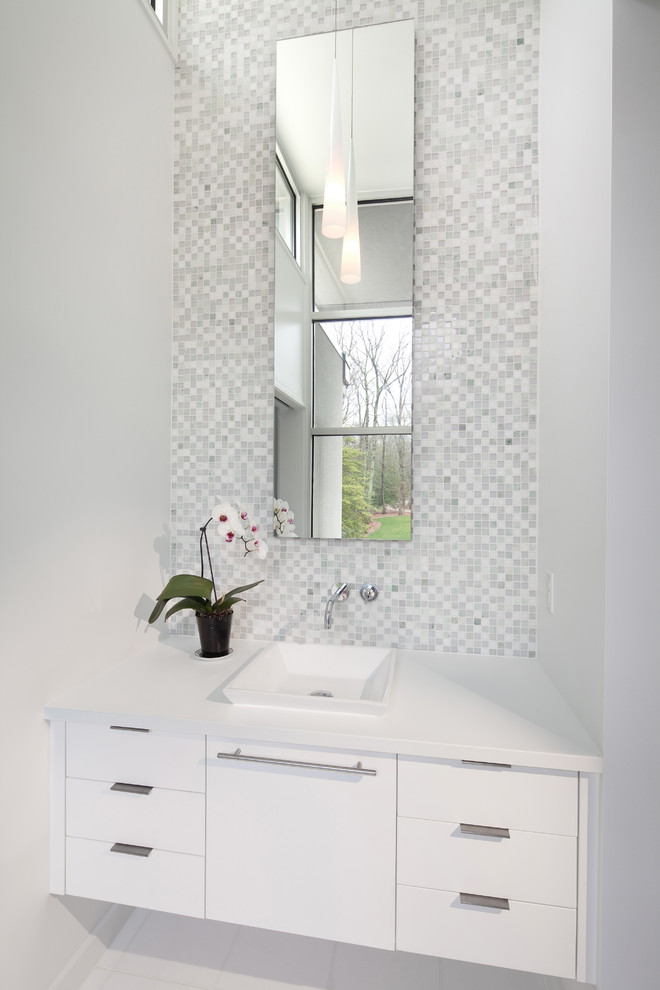 This is an example of a contemporary cloakroom in Baltimore with a vessel sink.
