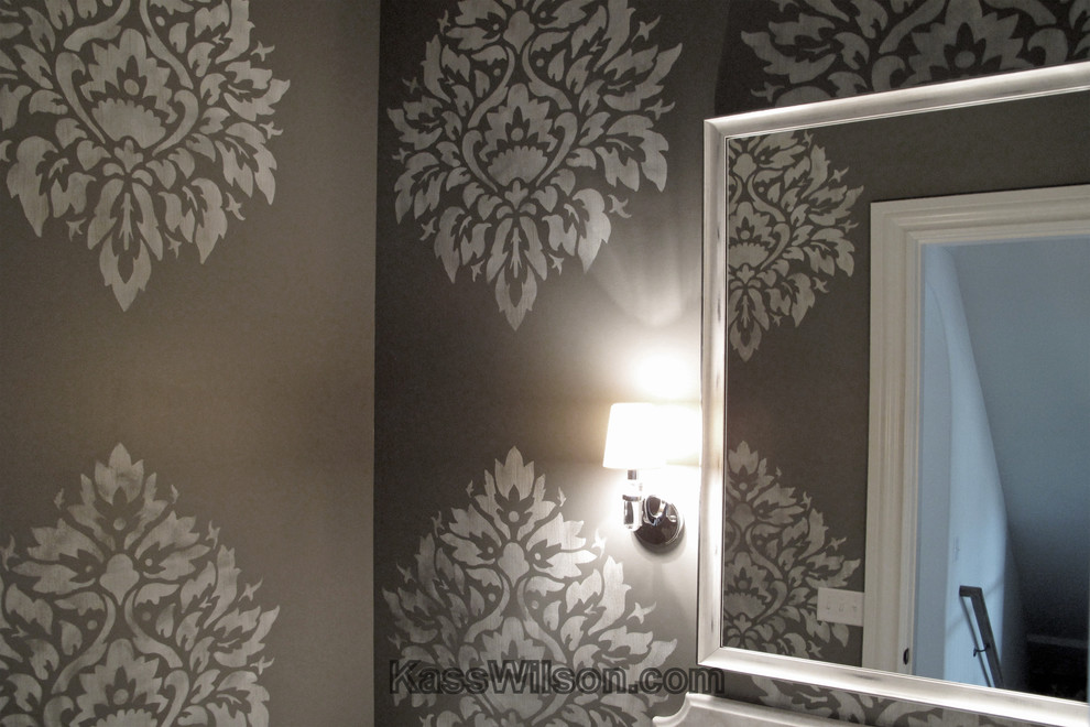 This is an example of a small traditional cloakroom in Atlanta with grey walls.