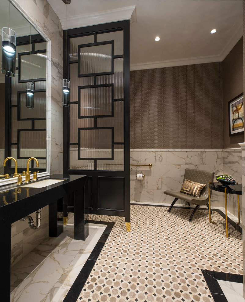 На фото: туалет в стиле неоклассика (современная классика) с врезной раковиной, разноцветной плиткой и коричневыми стенами с