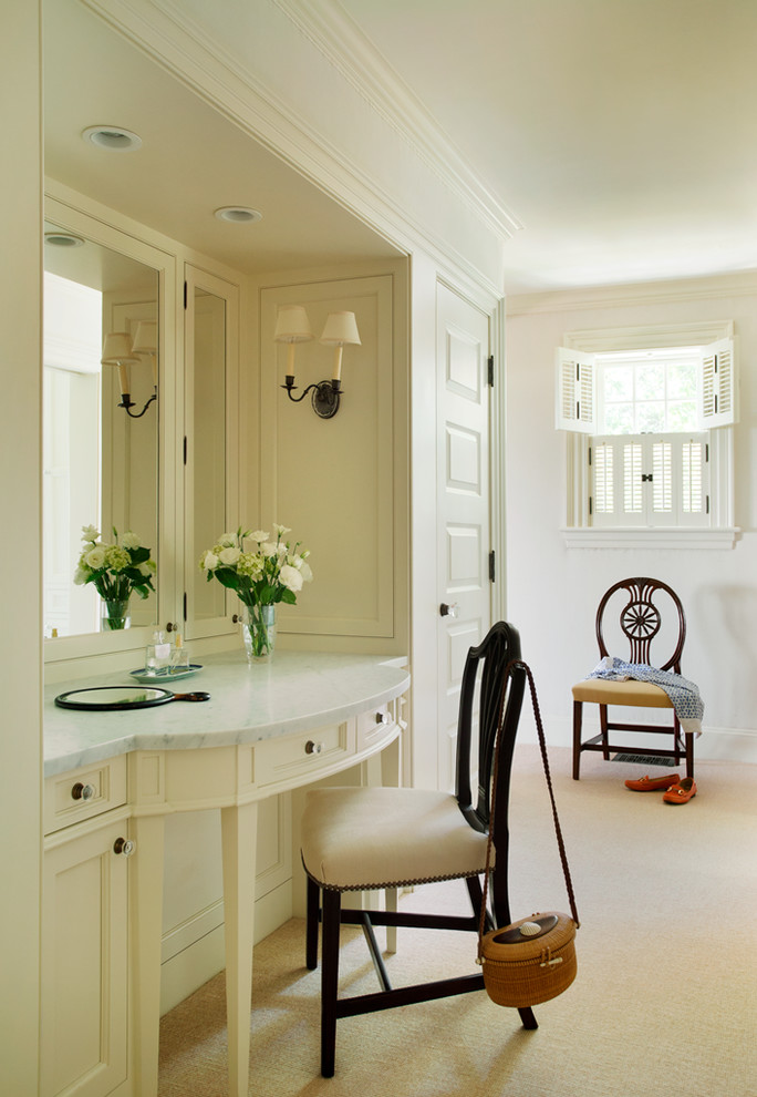 Example of a mid-sized beach style powder room design in Boston with beaded inset cabinets, white cabinets, marble countertops and white walls